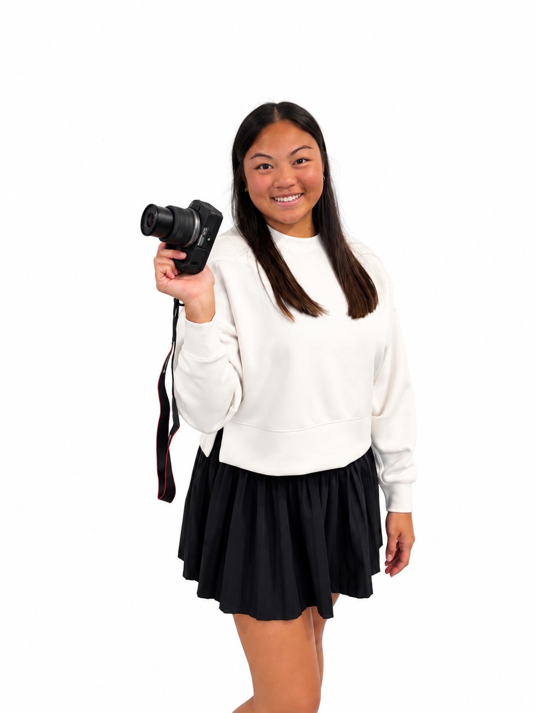 Crystal Huff smiling, holding her camera